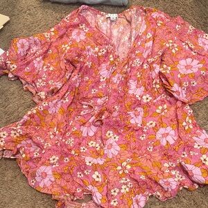 Pink Floral V-Neck Romper with Ruffle Hem